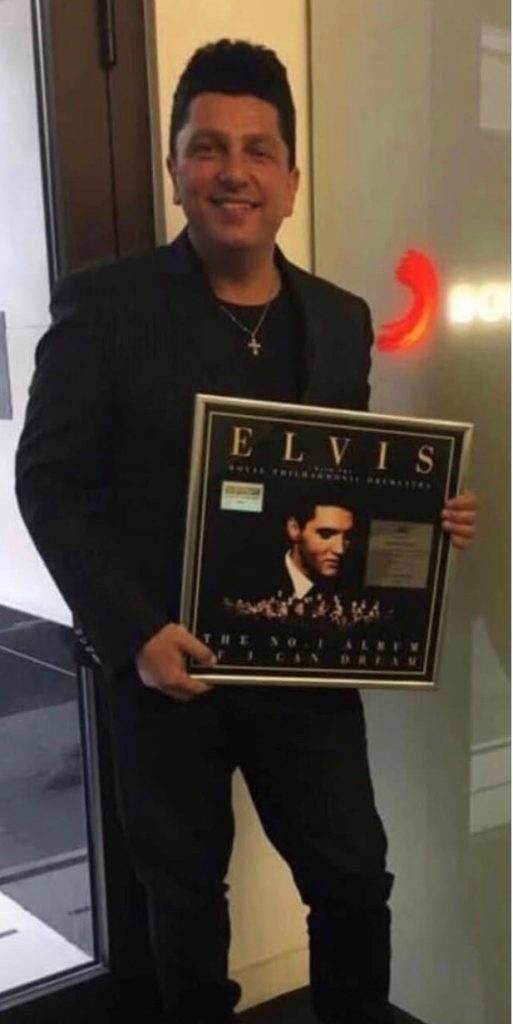 Mauro Dirago Mauro with his Elvis Album